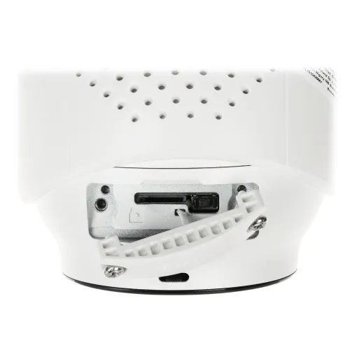 Biała kamera monitoringu z widocznymi otworami wentylacyjnymi i złączem na kable. Urządzenie ma solidną obudowę i jest przeznaczone do montażu na ścianie lub suficie.