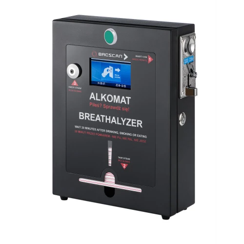 Stacjonarny alkomat BACscan F w czarnej obudowie z wyświetlaczem LCD i miejscem na wrzut monet. Urządzenie posiada instrukcje w języku polskim i angielskim oraz otwór na słomkę do badania.
