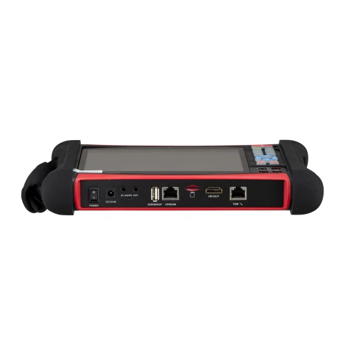 Na zdjęciu znajduje się tester CCTV typu all-in-one marki BCS-MS, wyposażony w ekran oraz różne porty wejścia i wyjścia, takie jak HDMI, USB i Ethernet. Urządzenie ma czarną obudowę z czerwonymi akcentami i jest przeznaczone do testowania systemów monitoringu.