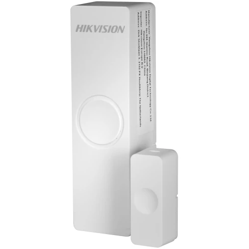 Bezprzewodowy system alarmowy Hikvision składa się z dwóch białych, prostokątnych modułów o minimalistycznym designie. Urządzenie jest przeznaczone do montażu na drzwiach lub oknach w celu wykrywania nieautoryzowanego otwarcia.