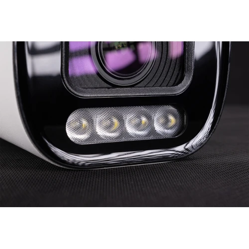 Zbliżenie na obiektyw kamery tubowej z widocznymi diodami LED poniżej. Kamera ma nowoczesny design z czarnymi i srebrnymi elementami.