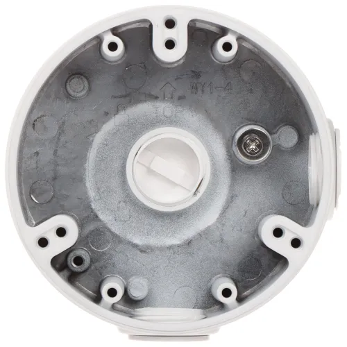 Zdjęcie przedstawia okrągłą, metalową podstawę montażową kamery z kilkoma otworami na śruby i centralnym mocowaniem. Widoczne są również oznaczenia i jedna zamocowana śruba.