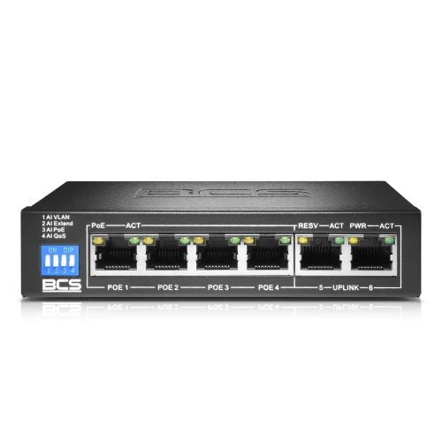 Zdjęcie przedstawia czarny switch sieciowy BCS z sześcioma portami Ethernet, z czego cztery są oznaczone jako PoE. Na przednim panelu znajdują się również diody LED sygnalizujące aktywność oraz przełączniki DIP do konfiguracji urządzenia.