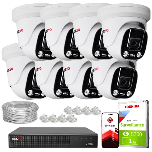 Zestaw do monitoringu składający się z ośmiu kamer, rejestratora, dysku twardego Toshiba 1TB, kabla oraz złączek. Na zdjęciu widoczna jest również aplikacja mobilna BtVision na ekranie smartfona.