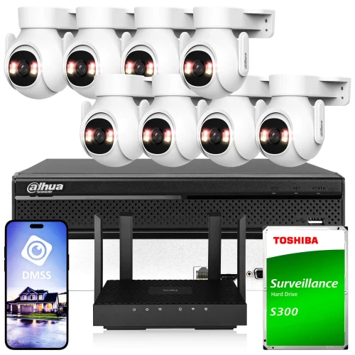 Na zdjęciu znajduje się zestaw do monitoringu, w skład którego wchodzi osiem białych kamer, rejestrator, router oraz dysk twardy Toshiba. Obok sprzętu widoczny jest smartfon z aplikacją do zarządzania systemem monitoringu.