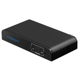Czarny konwerter BCS Coax z wyświetlaczem i przyciskami na przednim panelu. Urządzenie ma kompaktową, prostokątną obudowę z napisem "HDMI TECHNOLOGY" po lewej stronie.