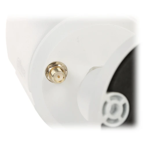 Zdjęcie przedstawia złącze antenowe umieszczone na białej obudowie urządzenia. Złącze jest metalowe, z gwintem i centralnym pinem, co sugeruje zastosowanie do podłączenia anteny zewnętrznej.